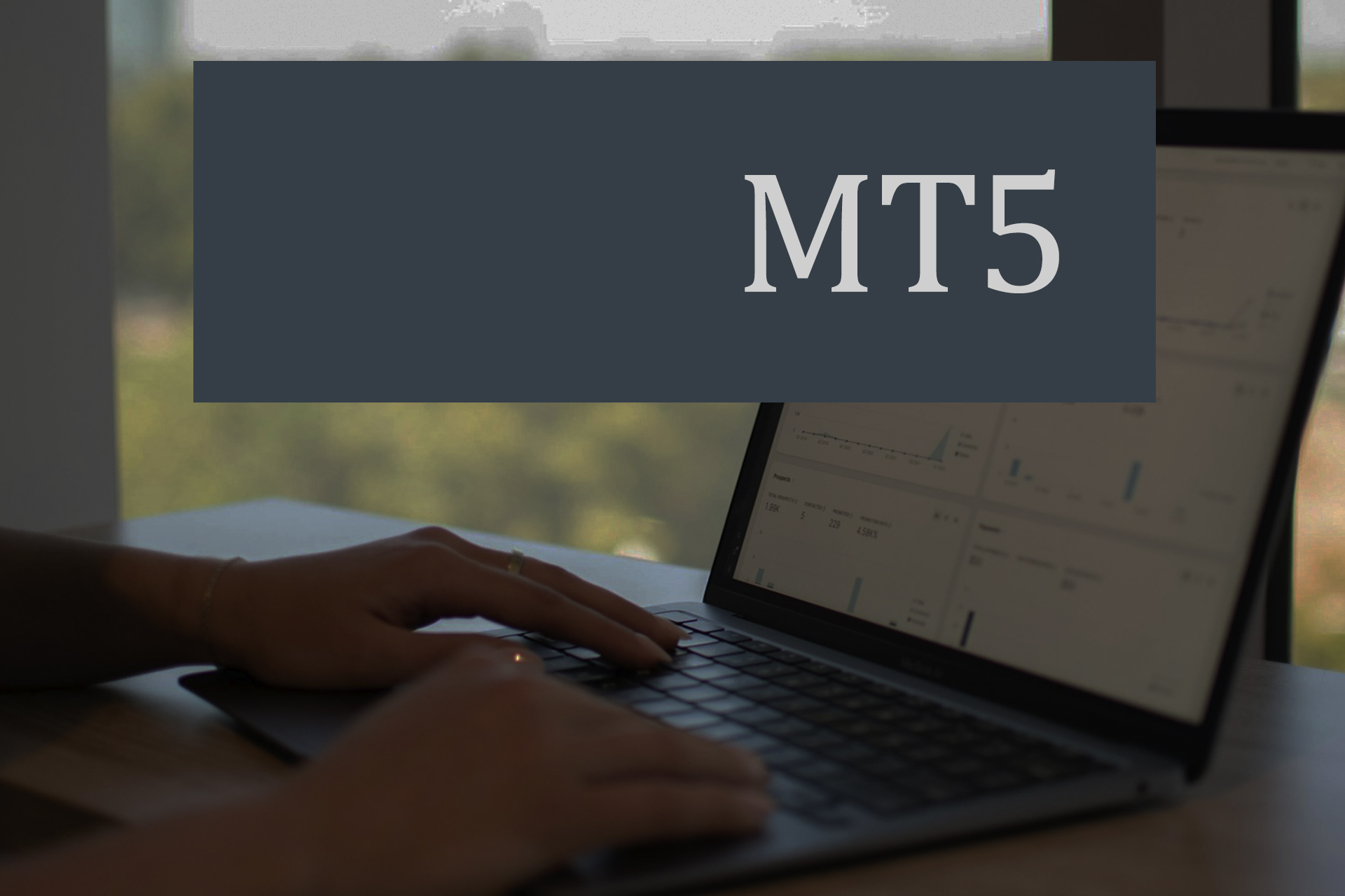 Enhancing Client Retention with Customizable White Label MT5 Analytics Dashboards Forex trader analyzing customizable MT5 dashboard on laptop.