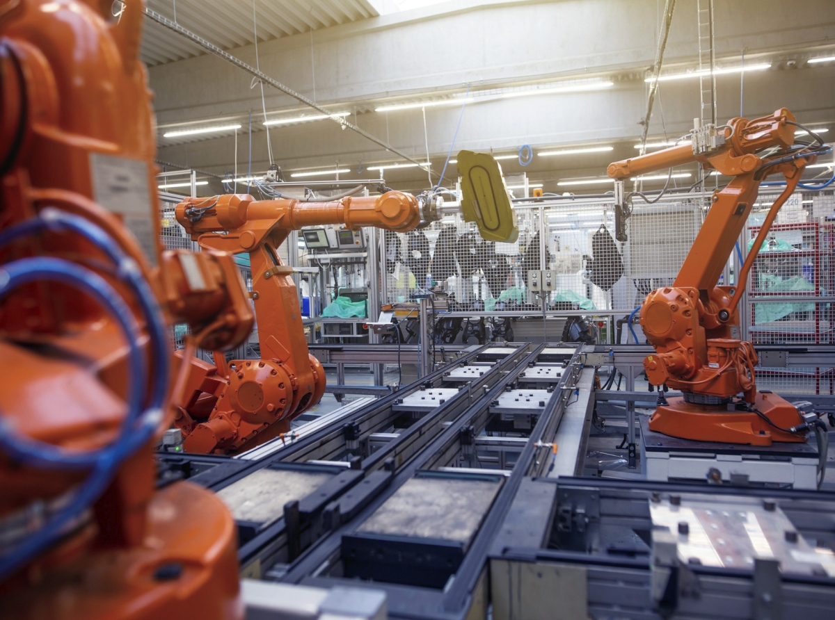 Industrial robots at a Chinese metalworking plant" / "Automated toy production line in China.