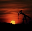 Oil Prices Hit Four-Year Lows as Oversupply Risks Mount